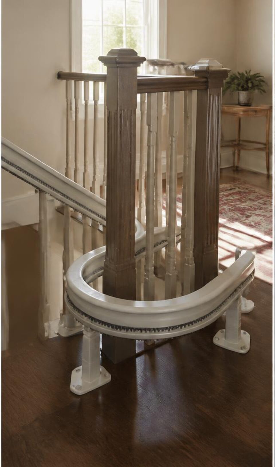 Curved stairlift rail fitted around a residential landing